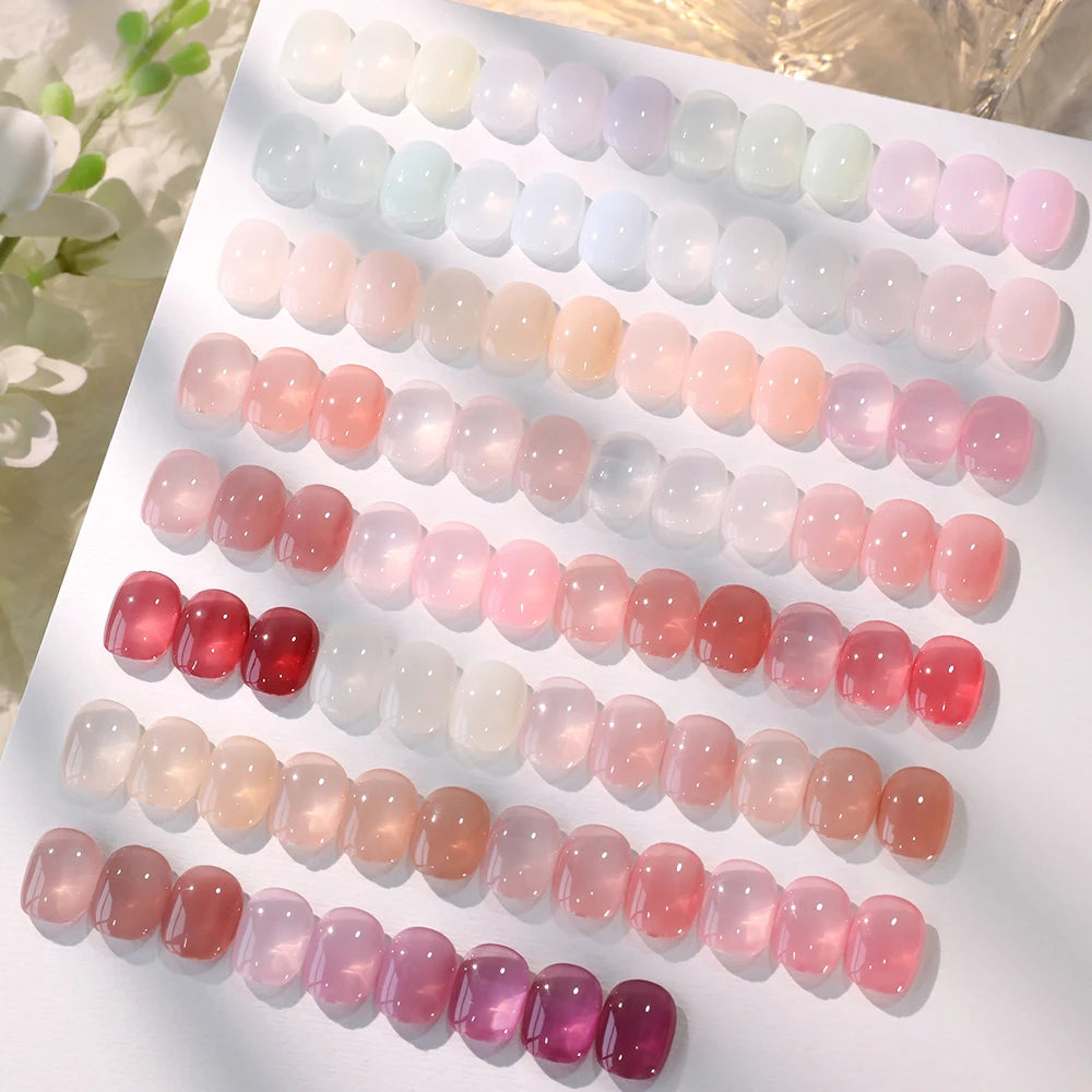 Closeup of Camellia nude jelly gel polish showing sheer milky finish on nails