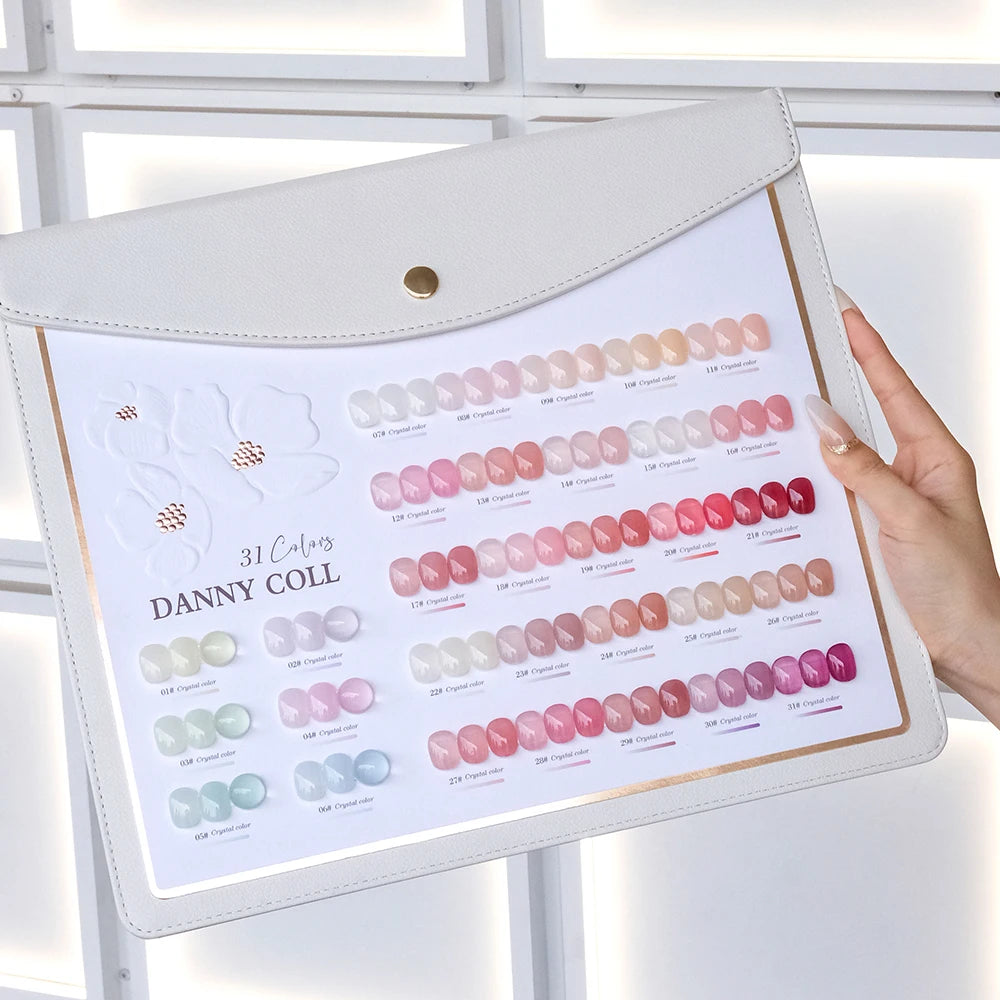 Swatches of 31 nude jelly gel polish shades from the Camellia set on nail tips